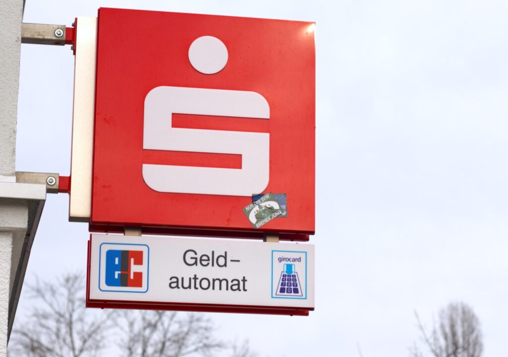 German ATMs are called Geld Automated and have the EC sign like in this image.