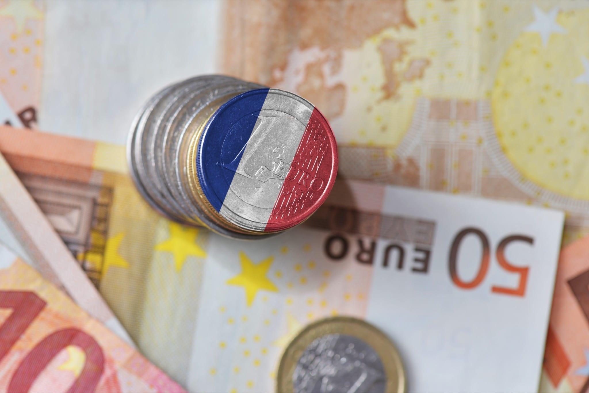 The money in France is the Euro, this image has some Euros with a French flag superimposed.