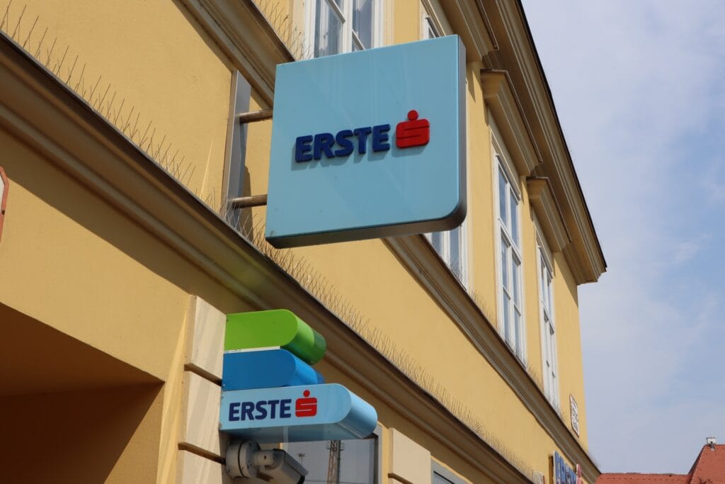 Austrian ATMs are called Geld Automat or more commonly Bankomat and have the Blue and Green sign like in this image.
